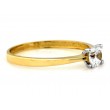 Złoty pierścionek cyrkonia w oprawie z białego złota
